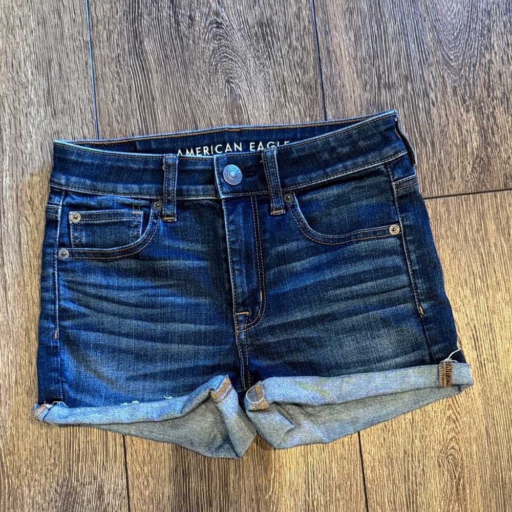 American Eagle Light Blue Denim with Tan Stitching